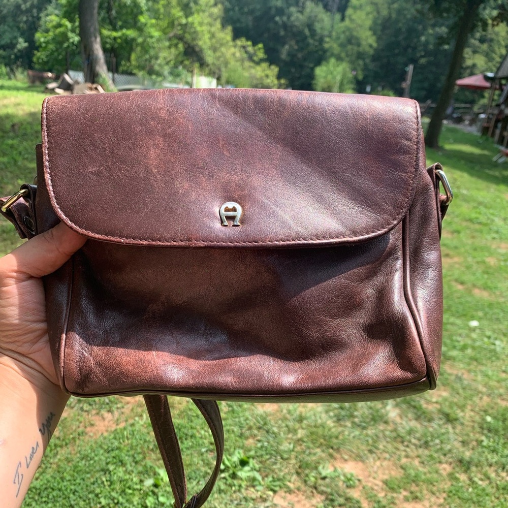 Etienne aigner genuine leather cross body purse. Wine/dark brown color.